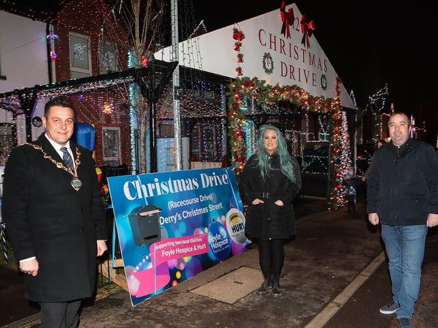 Mayor Graham Warke on a visit to Christmas Drive, which is lit up for Christmas as a fundraiser for the Foyle Hospice and Hurt charities. Included are Laura Meehan, fundraiser, and Colr. Brian Tierney. (Photo - Tom Heaney, nwpresspics)