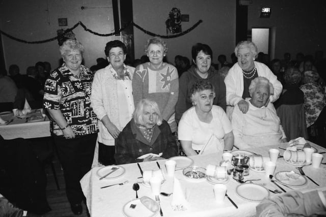 Senior citizens enjoying Christmas dinner in St. Mary’s parish hall in Creggan in December 1996.