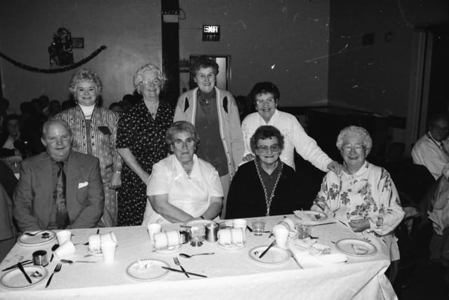 Guests at the annual Christmas dinner at St. Mary’s parish hall in Creggan.