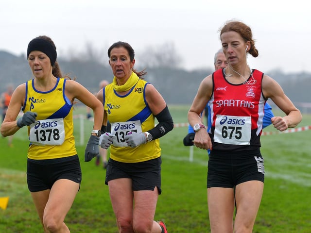 City of Derry Spartan Ciara Frazer overtakes North Down Athletic Club's Julie Wilson and team-mate at Templemore. Photo: George Sweeney.  DER2150GS – 069