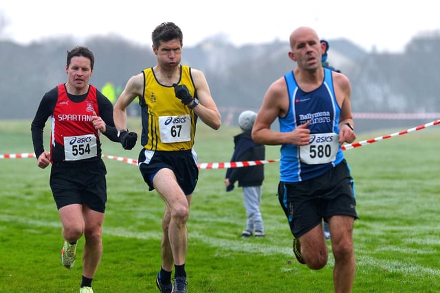 Niall McGee (67), Inishowen Athletic Club chases Ballymena Runners' Ian McCracken with City of Derry's Kieran Hurley for company. Photo: George Sweeney.  DER2150GS – 065