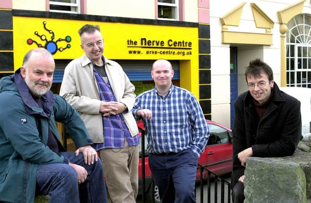 Radio 1 D.J. John Peel pictured outside the Nerve Centre with Pearse Moore, manager, second from right, when he took a break from filming a documentary on The Undertones. Included are brothers John and, on right, Damian O'Neill, band members. (17/10/BD1)