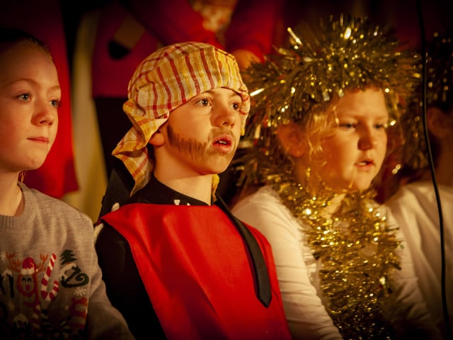 Primary 7 pupils - Aoife, Ruaidhri and Tori performing during Nativity at Steelstown PS.