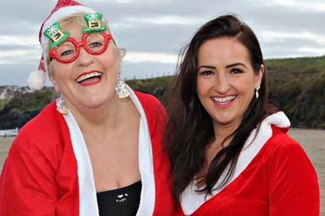 Jillian McCarthy and Leone Paul of The Olive Branch who took park in the Christmas Eve sponsored dip in the sea