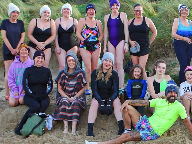 Derry celebrity Mickey Doherty joins the ladies from the "Waves" cold water swim group organised by "Mammy Banter" for the New Year's swim at Lisfannon Beach. Photo: George Sweeney. DER2152GS 022