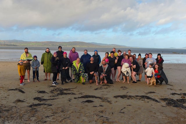 Group who took part in ARC Fitness New Year’s Day Charity Swim at Lisfannon beach, Inishowen. Photo: George Sweeney.  DER2152GS – 007