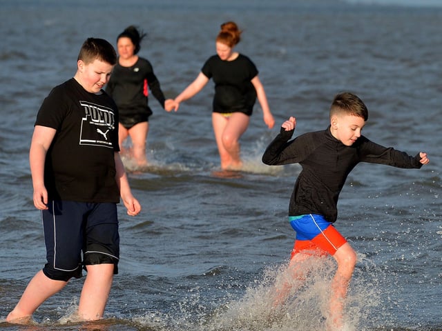 Young lads who took part in the ARC Fitness New Year’s Day Charity Swim at Lisfannon beach, Inishowen. Photo: George Sweeney. DER2152GS – 018