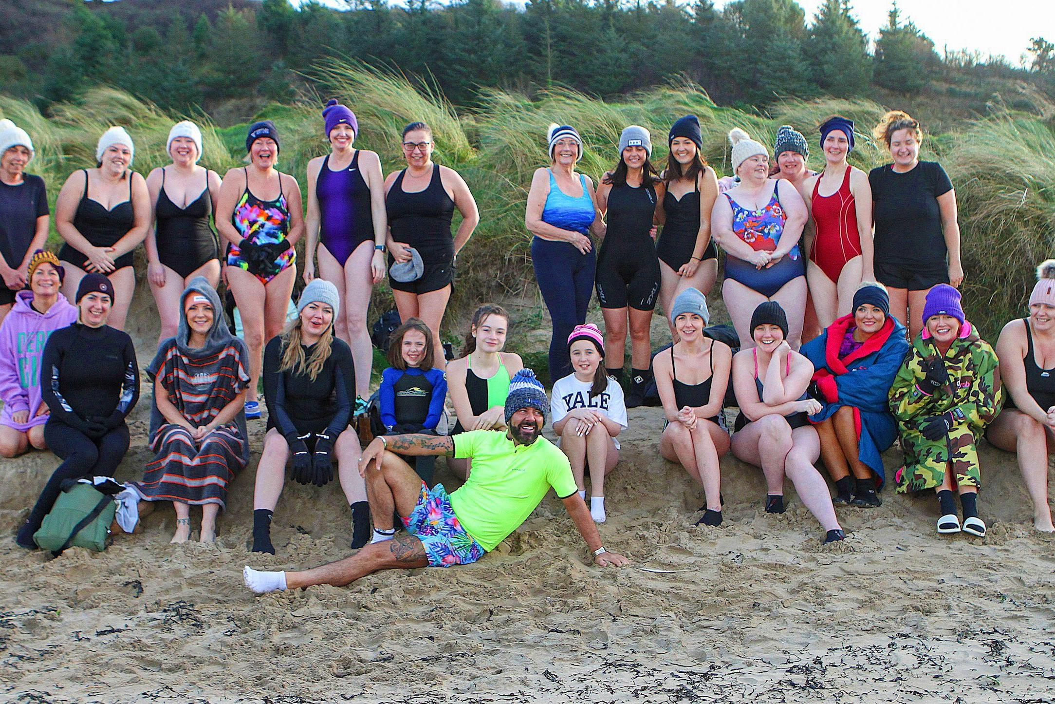 Derry celebrity Mickey Doherty joins the ladies from the "Waves" cold water swim group organised by "Mammy Banter" for the New Year's swim at Lisfannon Beach. Photo: George Sweeney.  DER2152GS  022