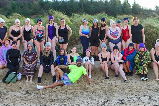 Derry celebrity Mickey Doherty joins the ladies from the "Waves" cold water swim group organised by "Mammy Banter" for the New Year's swim at Lisfannon Beach. Photo: George Sweeney. DER2152GS 022