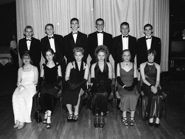 From left, seated, Jacky Johnston, Amanda Ferguson, Michelle Brace, Emma Simpson, Karen Knobbs and Gemma Keighley. Standing, Jonathan Heywood, Billy Heywood, Glen Montgomery, Darren Mitchel, Leslie Curry and Ally Dunn, at the Faughan Valley High School formal at the Inn at the Cross.