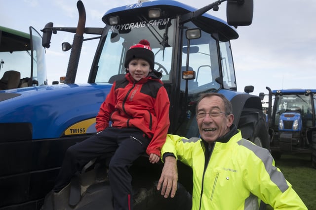 David McKeown and his grandson Jack McKeown pictured at Mosside Presbyterian Church Tractor run on Saturday to raise funds for the Air Ambulance Northern Ireland. PICTURE KEVIN MCAULEY/MCAULEY MULTIMEDIA