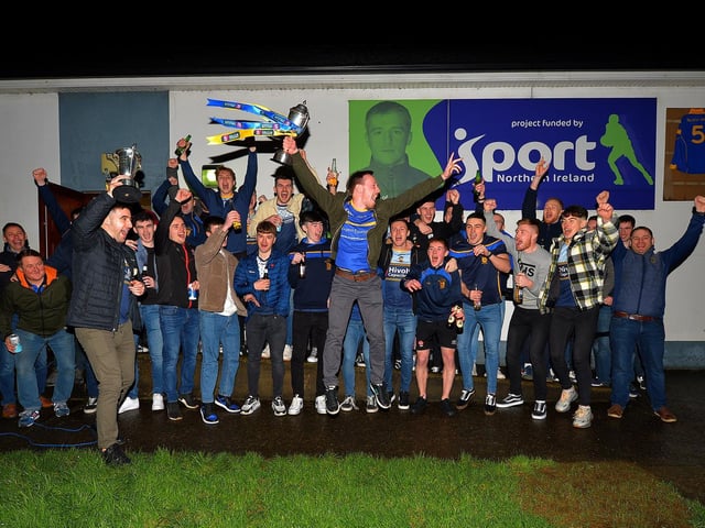 Steelstown captain Neil Forester and players pictured outside their clubhouse on Sunday evening.
