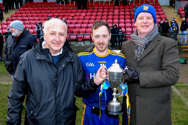 Brian Og McKeever senior (left) pictured with Steelstown captain Neil Forester and one of the club’s founders Philip Devlin  at Owenbeg.