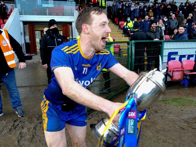 Steelstown’s captain Neil Forester races onto the pitch with the cup to celebrate their Ulster GAA Football Intermediate Club Championship victory