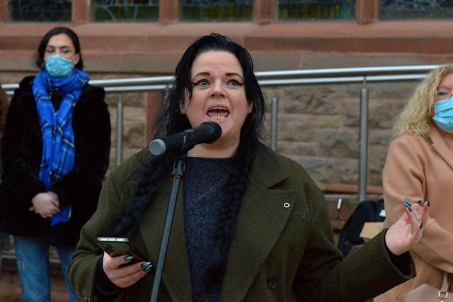 Mel Bradley reads a poem during the vigil for Ashling Murphy held at the Guildhall Steps on Friday afternoon. Photo: George Sweeney.  DER2202GS – 084