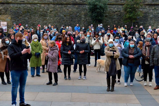 Some of the attendance at the vigil for Ashling Murphy held at the Guildhall Steps on Friday afternoon. Photo: George Sweeney.  DER2202GS – 095