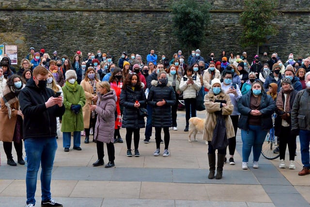 Some of the attendance at the vigil for Ashling Murphy held at the Guildhall Steps on Friday afternoon. Photo: George Sweeney.  DER2202GS – 095