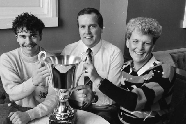 Molly and Jack Quigley, proprietors of Boulevard night club, with Terence Morrison, winner of the 1987 Anna Sweeney Memorial Cup, launching the annual talent competition in January 1988.