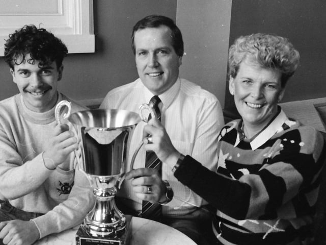 Molly and Jack Quigley, proprietors of Boulevard night club, with Terence Morrison, winner of the 1987 Anna Sweeney Memorial Cup, launching the annual talent competition in January 1988.