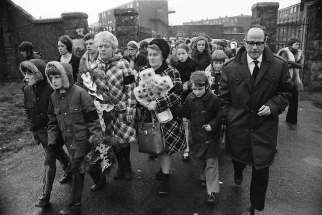 1973... The Kelly family visit the cemetery on the first anniversary of Bloody Sunday.