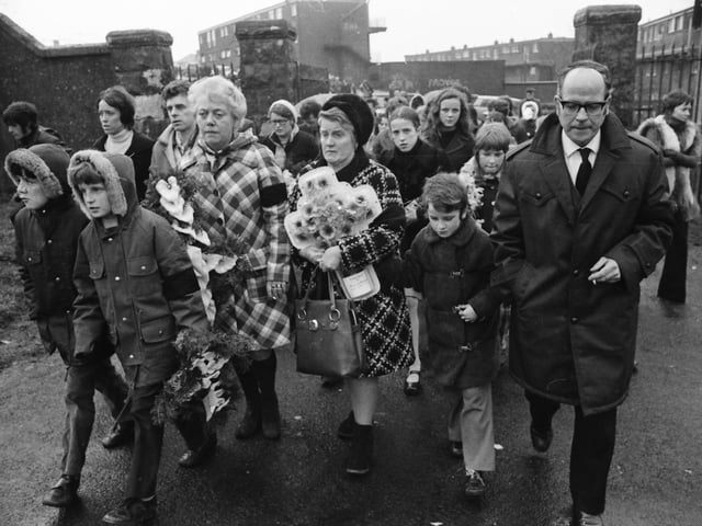 1973... The Kelly family visit the cemetery on the first anniversary of Bloody Sunday.