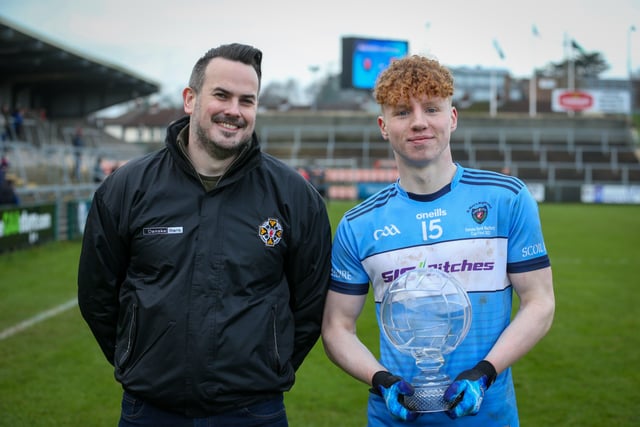 St Mary's Niall O'Donnell with his man of the match trophiy presented by  Kevin Heavern, Head of Marketing at Danske Bank. Picture:  Matt Mackey / Press Eye.