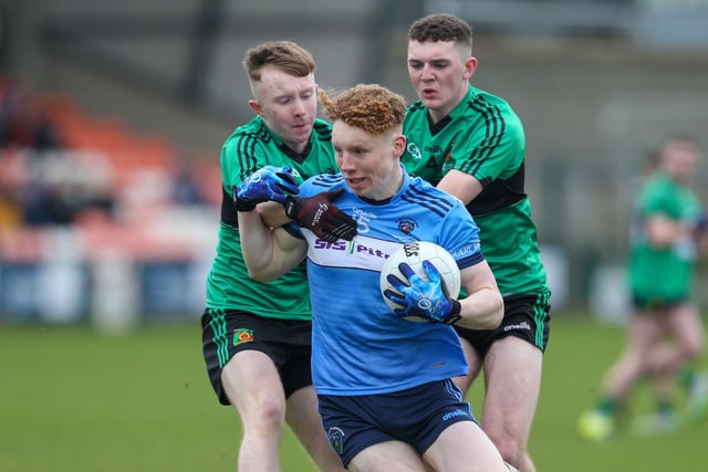 Holy Trinity’s Brian Hampsey in action with St Mary's Niall O’Donnell. Picture: Matt Mackey / Press Eye.