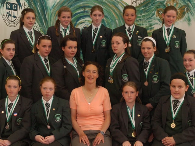 Danea Herron, seated centre, with St Cecilia's College Year 8 pupils who won medals at the schools annual sports day, held at Templemore Sports Complex. (2706PG29)