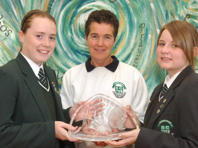 Lauren Doherty, left, and Eyesha McMullan, junior head girl, from St Cecilias College, who have won the Health Promotion Gold Award for promoting environmental and physical health initiatives within the school. Included is vice principal Roisin Lynch. (2706PG31)