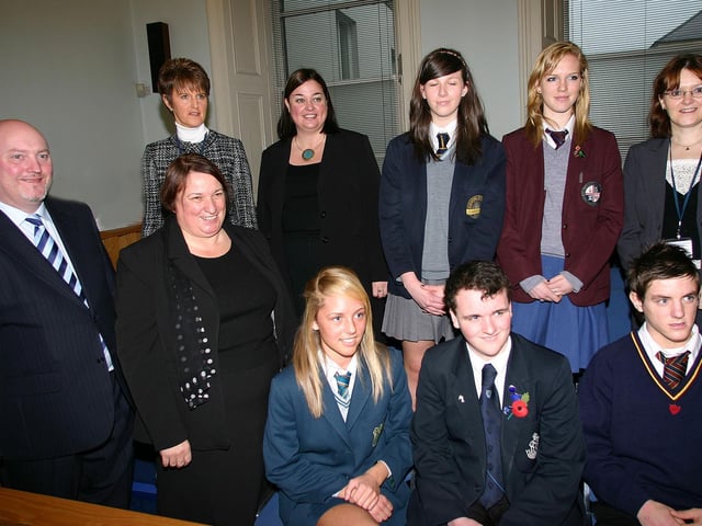 Students representing Foyle and Londonderry College, Thornhill College, Oakgrove Integrated College, St Cecilia's College, Lumen Christi and Limavady Grammar School with from left (front row), Mr. B. McElhone, Resident Magistrate, and Her Honour Judge Philpott, Counry Court judge. Back row: Paula mcCourt, Court Service regional manager, Paula Jack, Public prosecution Service NI, and Wilma McKeegan (back row right}, Court administrator.
(right)