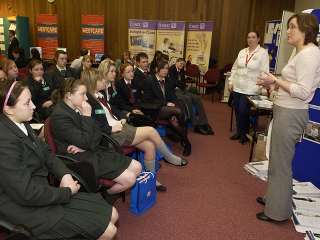 Social worker Marie Gormley with pupils from St Cecilias College and Lisneal College. (3103PG06)