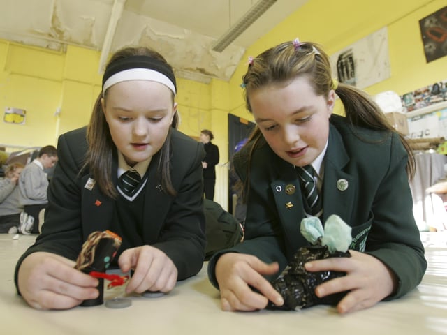 St. cecilia's students Natalie Doherty and Temair Hamilton participating in The Source recycling art class. (0302C30)
