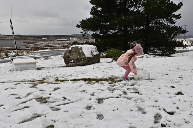 Enjoying the snow brought by Storm Eunice. Picture: Colm Lenaghan/ Pacemaker