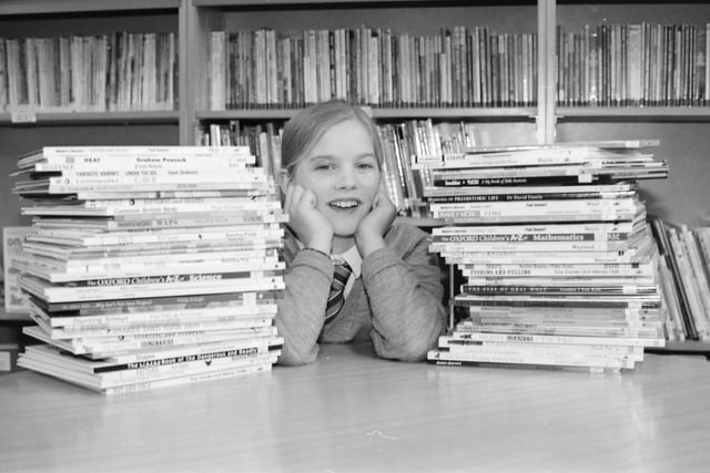 Donemana Primary School pupil Natasha Durham taking advantage of the new school library that was opened by Joe Martin, the Chief Executive of the Western Education and Library Board, in February 1997.