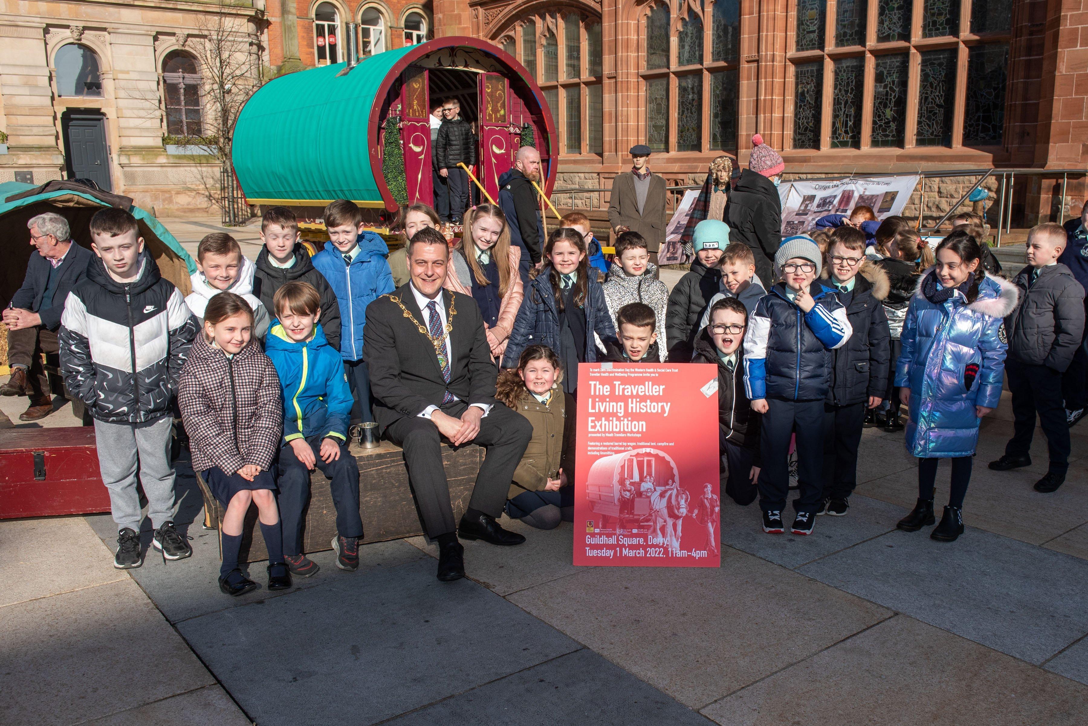 The Traveller Living History Exhibition which was visited by Derry City and Strabane District Council Mayor,  Alderman Graham Warke, and pupils from Longtower Primary School. During their visit, they heard Nell Donagh explain the history of Travellers and how they lived and were provided with a demonstration of crafting by tinsmith, Tom McDonald. Photos: Martin McKeown.