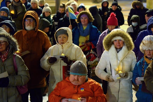 People gather in Guildhall Square on Wednesday evening last for prayers and a candle-lit vigil in solidarity with the people of Ukraine.  Photo: George Sweeney.  DER2209GS – 025