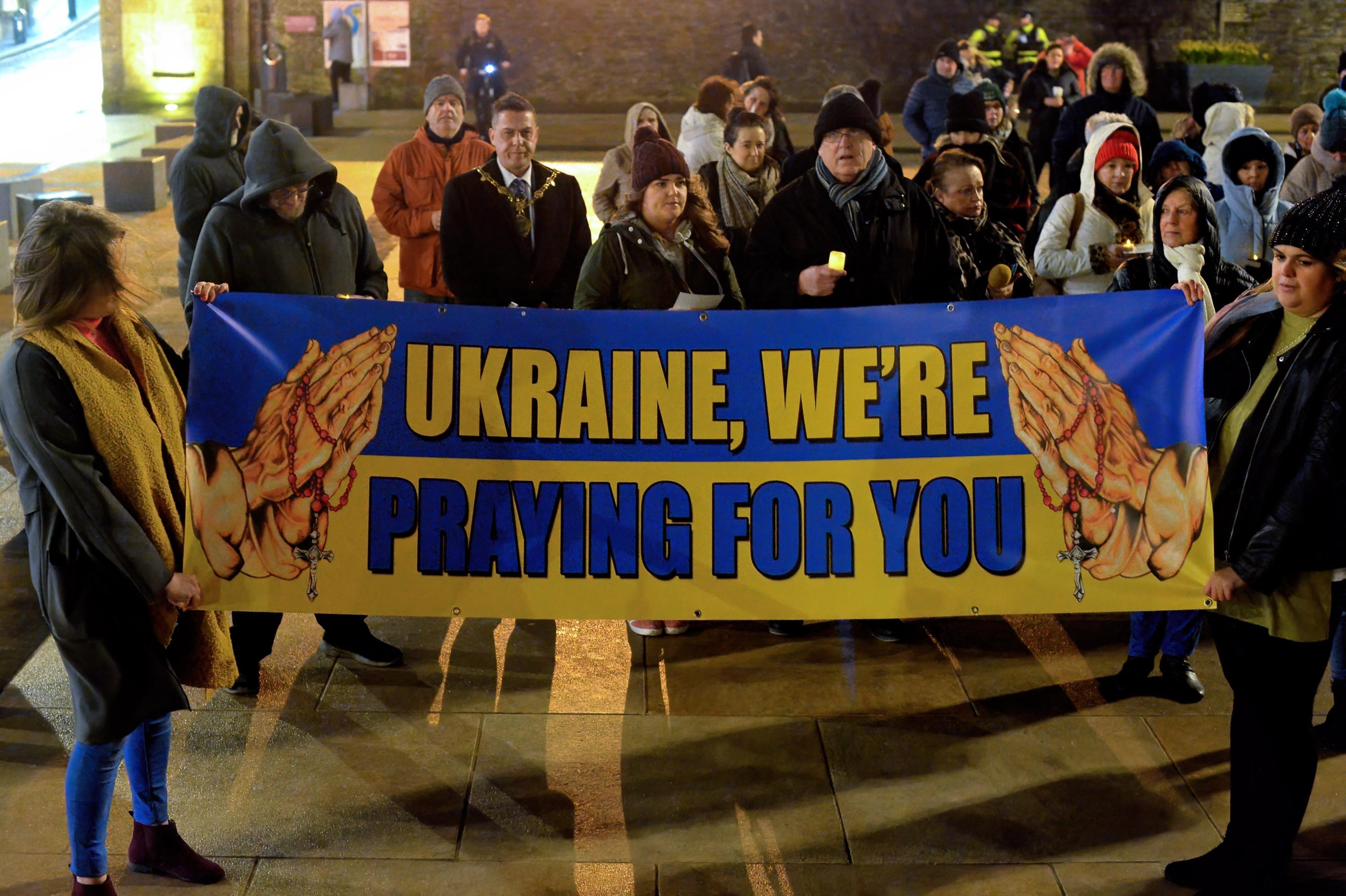 Mayor Graham Warke was among the attendance at a candle-lit vigil in solidarity with the people of Ukraine in Guildhall Square on Wednesday evening last.  Photo: George Sweeney.  DER2209GS – 022