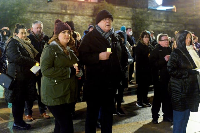 People gather in Guildhall Square on Wednesday evening last during a candle-lit vigil in solidarity with the people of Ukraine.  Photo: George Sweeney.  DER2209GS – 031