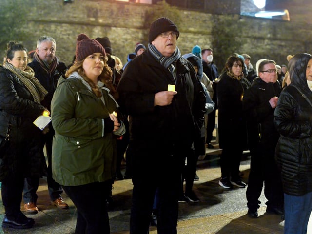 People gather in Guildhall Square on Wednesday evening last during a candle-lit vigil in solidarity with the people of Ukraine. Photo: George Sweeney. DER2209GS – 031