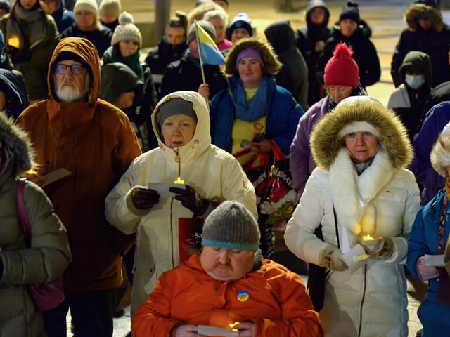 People gather in Guildhall Square on Wednesday evening last for prayers and a candle-lit vigil in solidarity with the people of Ukraine.  Photo: George Sweeney.  DER2209GS – 025