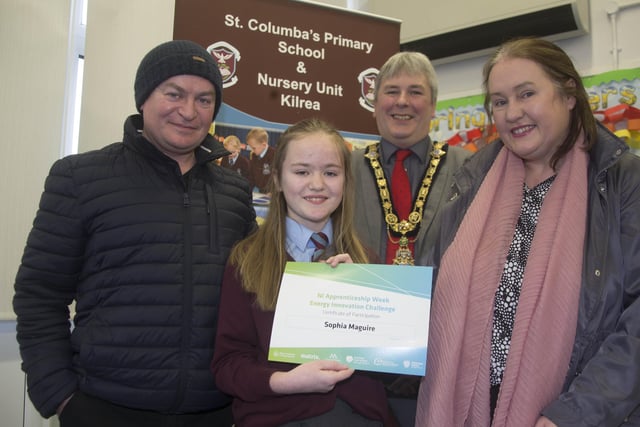 The Mayor of Causeway Coast and Glens Borough Council Councillor Richard Holmes pictured with Energy Innovation Challenge winner Sophia Maguire and her parents Caroline and Kevin