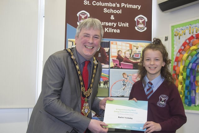 The Mayor of Causeway Coast and Glens Borough Council Councillor Richard Holmes presents a certificate to Rachel McAuley who took part in the Energy Innovation Challenge