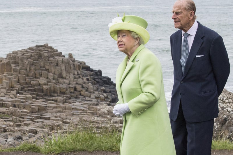 Queen Elizabeth II and Prince Philip, Duke Of Edinburgh visit the Giants Causeway on June 28, 2016 in County Antrim, Northern Ireland, United Kingdom.