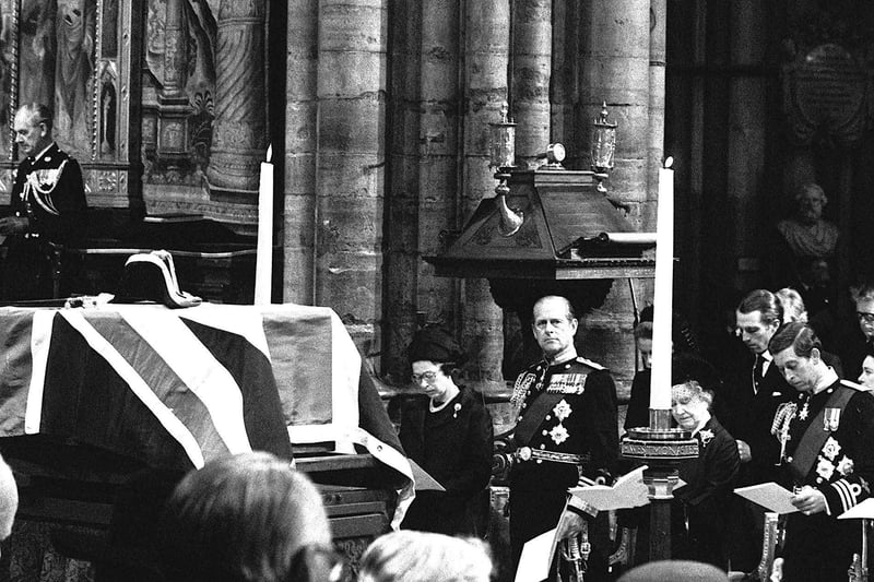 The Union flag-draped coffin of Lord Mountatten rests on a catafalque during the funeral service in Westminster Abbey. Royal mourners are (l/r) Queen Elizabeth II, her husband The Duke of Edinburgh, Queen Elizabeth The Queen Mother and the Prince of Wales