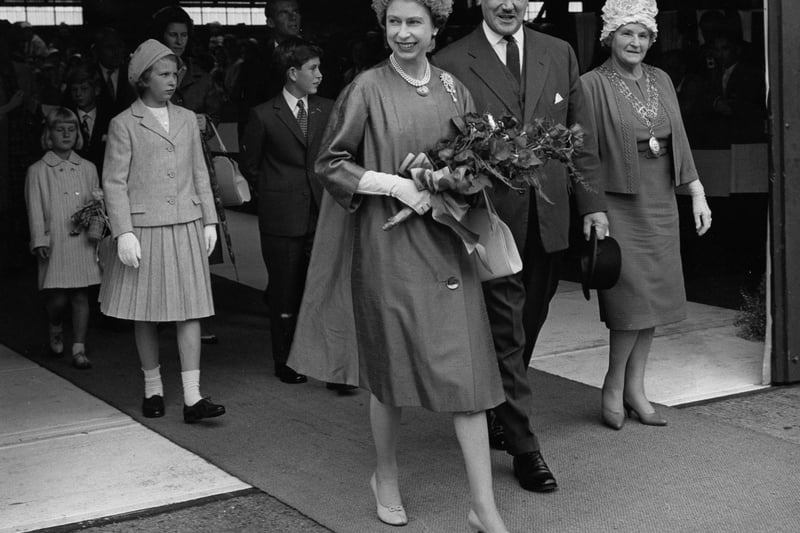 Queen Elizabeth II, Princess Anne and the Prince of Wales about to board the Royal Yacht Britannia at Southampton to join the Duke of Edinburgh for their visit to Northern Ireland.