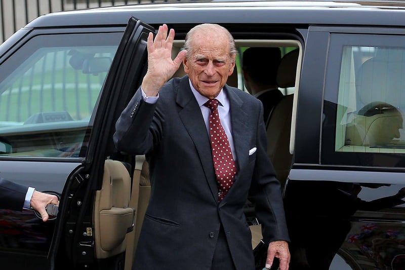 Prince Philip waves to well-wishers during a visit to Crumlin Road jail in June 2014. Picture - Kevin Scott / Presseye