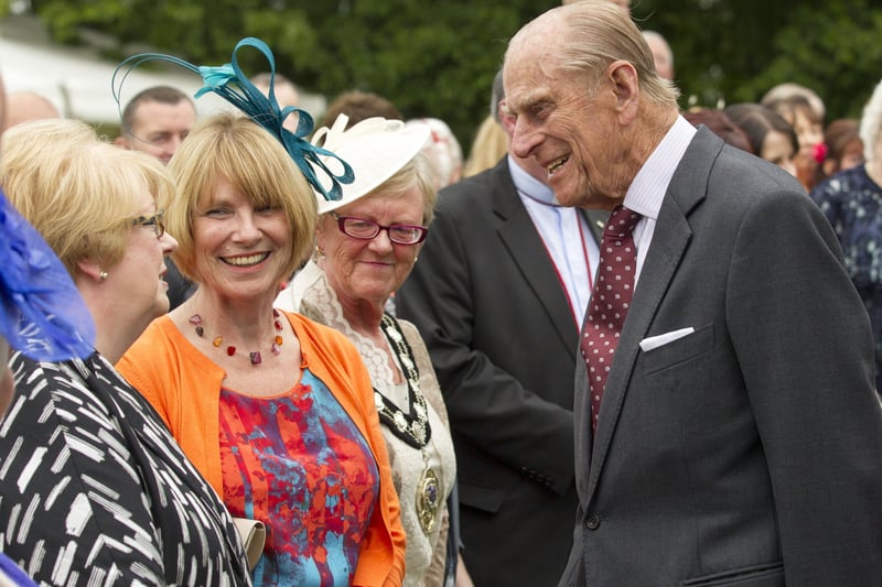 Prince Philip, Duke of Edinburgh meets guests during a garden party held at Hillsborough Castle on day two of their visit on June 24, 2014  (Photo by Liam McBurney - Pool/Getty Images)