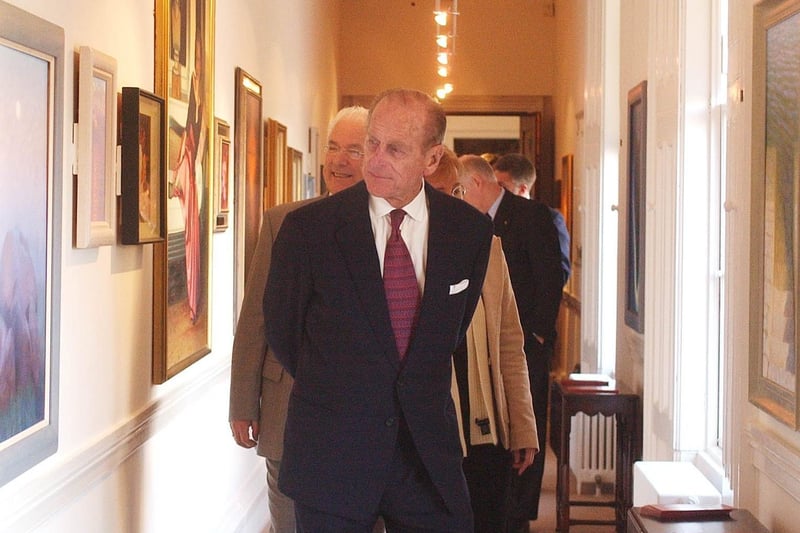 Prince Philip admires the art in the new Gallery at Hillsborough Castle during his visit to present the Duke of Edinburgh Gold awards.
PICTURE BY STEPHEN DAVISON