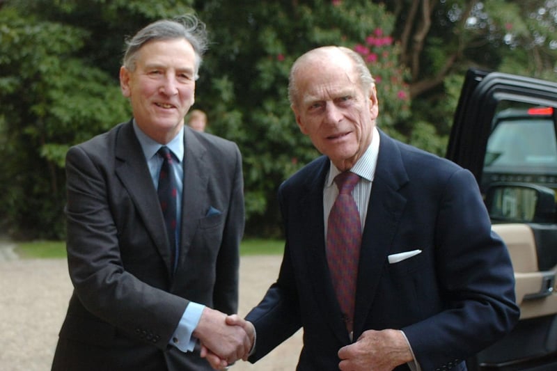 His Royal Highness, The Duke of Edinburgh talks with photographer David Lavery after meeting recipients and guests of the Duke of Edinburgh Award Scheme at a special reception at Hillsborough Castle as they recieved their Gold Awards. Picture Charles McQuillan/Pacemaker.