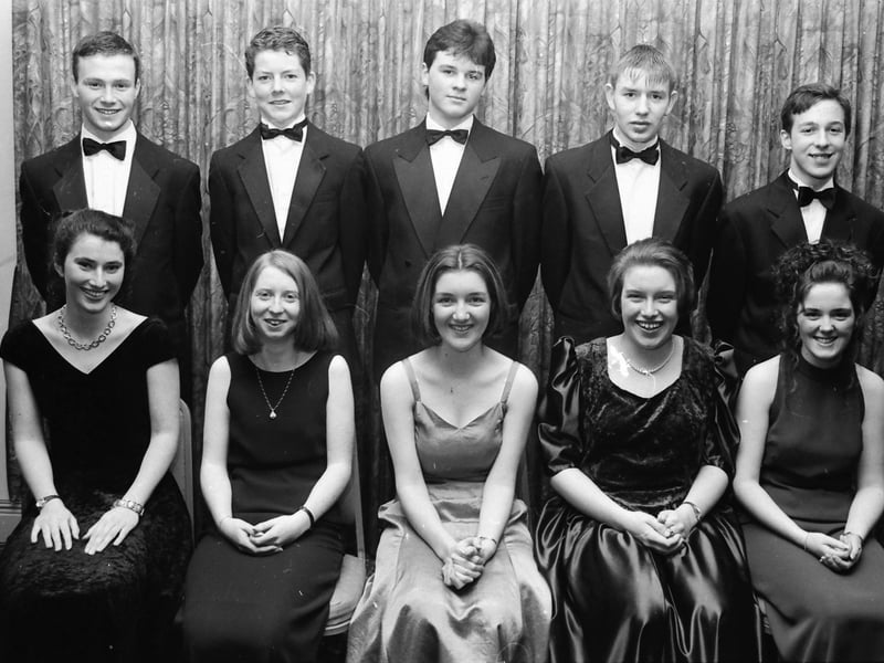 At front are Brenda Friel, Sharon Gormley, Lisa Tracey, Maria Sweeney and Jennifer Conaghan. At back are Ian Ellis, Richard Harkin, Brendan McGurk, Martin Harron and Peter Mulvey.
